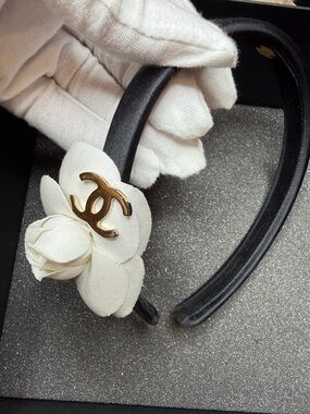 CHANEL Black Headband with Cream Camellia and Gold CC